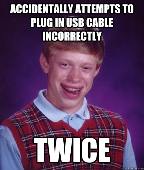 accidentally attempts to plug in usb cable incorrectly twice  Bad Luck Brian