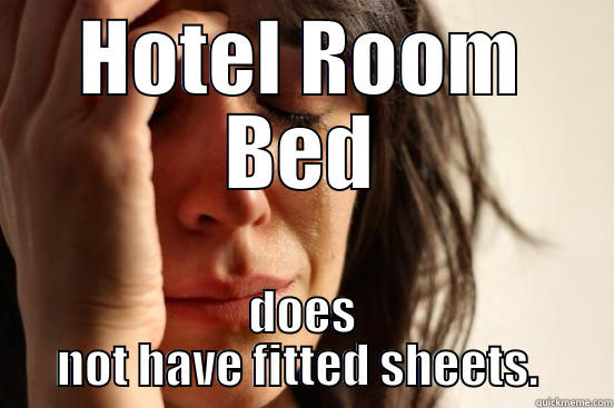 HOTEL ROOM BED DOES NOT HAVE FITTED SHEETS.  First World Problems