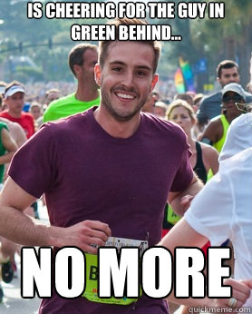 Is cheering for the guy in green behind... no more  Ridiculously photogenic guy