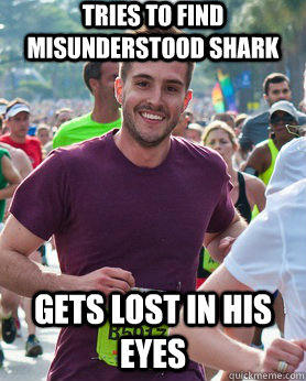 tries to find misunderstood shark gets lost in his eyes  Ridiculously photogenic guy