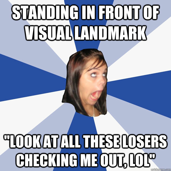 standing in front of visual landmark 