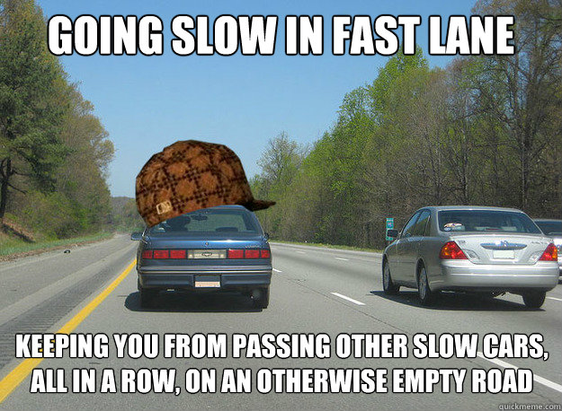 Going slow in fast lane Keeping you from passing other slow cars, all in a row, on an otherwise empty road  