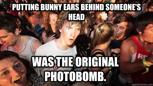 Putting bunny ears behind someone's head  was the original photobomb.  Sudden Clarity Clarence