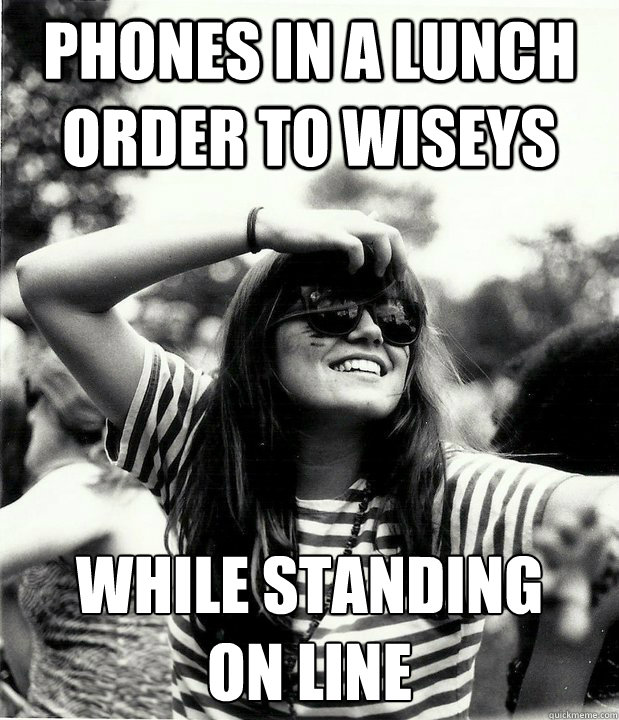 phones in a lunch order to wiseys While standing
on line  Georgetown Hipster