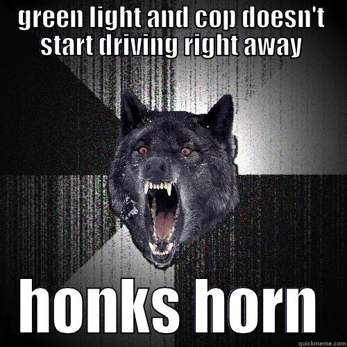 GREEN LIGHT AND COP DOESN'T START DRIVING RIGHT AWAY HONKS HORN Insanity Wolf