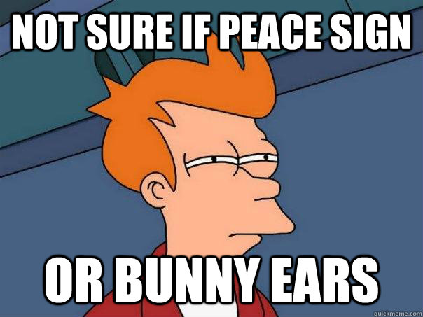 Not sure if peace sign OR BUNNY EARS  Futurama Fry