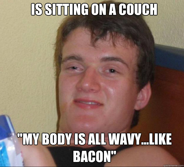 Is sitting on a couch 